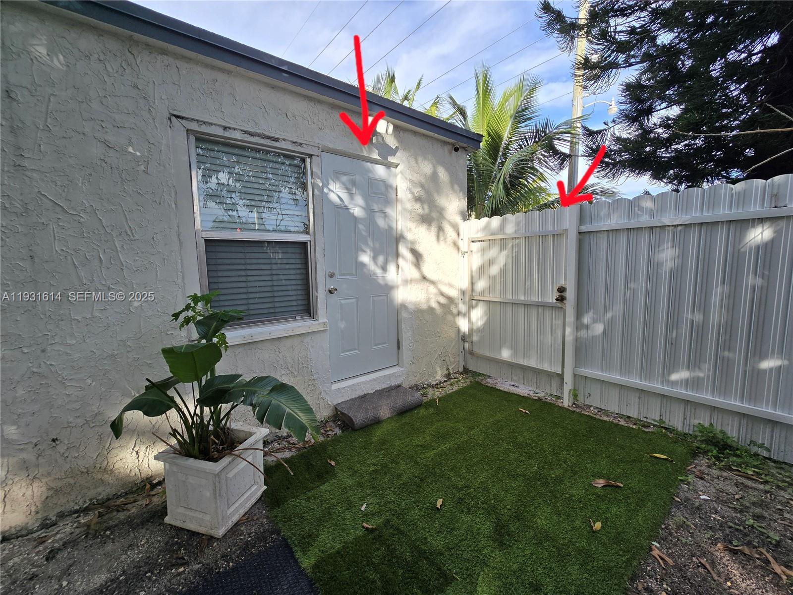 13340 Northeast 16th Avenue North Miami, FL 33161 - Photo 14 of 18 a view of a house with a backyard and garden
