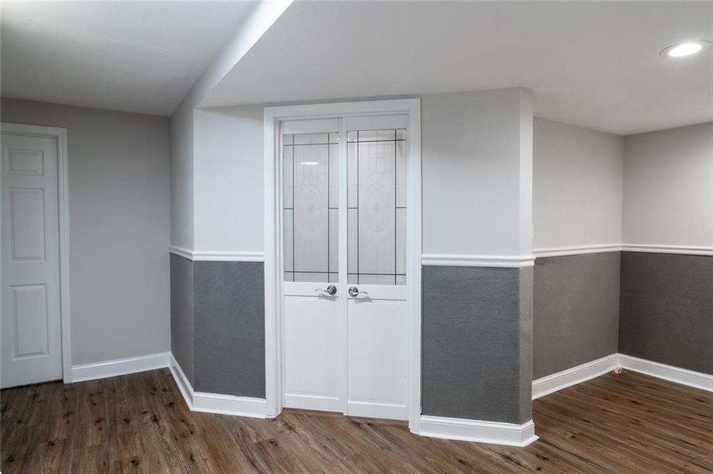 3599 Lower Roswell Road Marietta, GA 30068 - Photo 25 of 34 an empty room with wooden floor