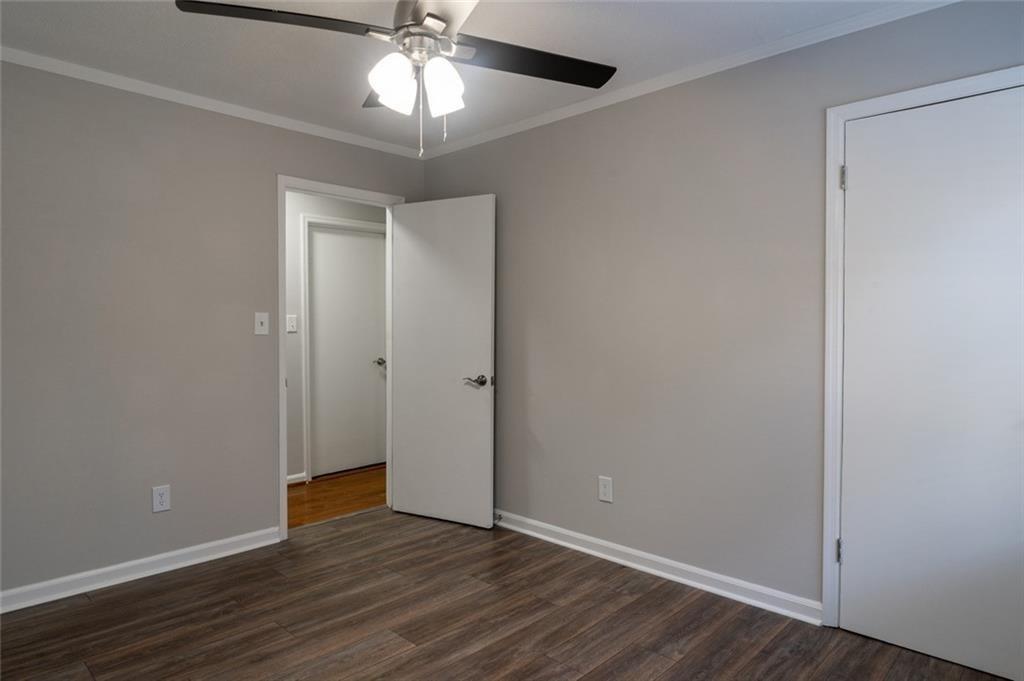 3599 Lower Roswell Road Marietta, GA 30068 - Photo 26 of 34 a view of an empty room with wooden floor