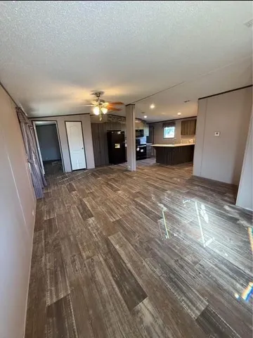 a view of a livingroom with a furniture