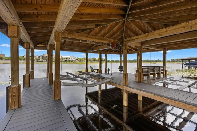 a bathroom with a shower sink and mirror