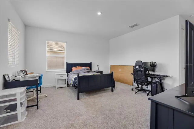 a view of an entryway and livingroom