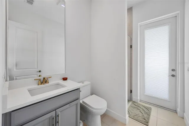 a view of a dining room with furniture and window