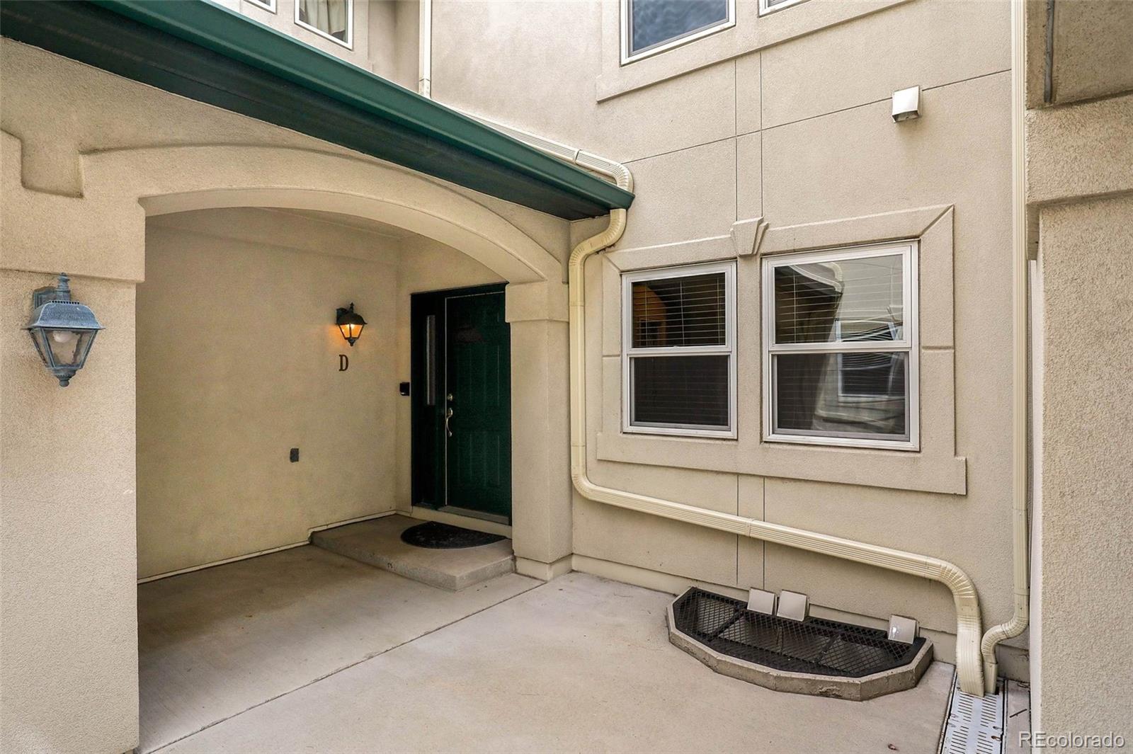 6677 South Forest Way, Unit D Centennial, CO 80121 - Photo 2 of 35 a front view of a house