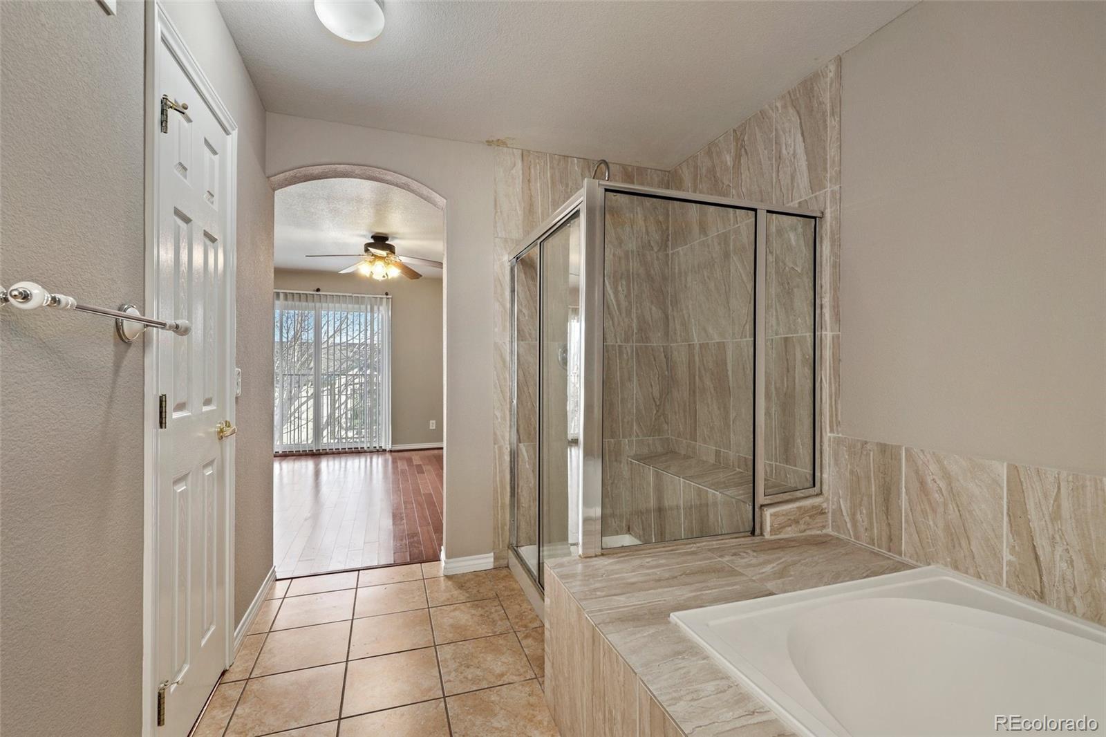 6677 South Forest Way, Unit D Centennial, CO 80121 - Photo 25 of 35 a view of an empty room with glass door