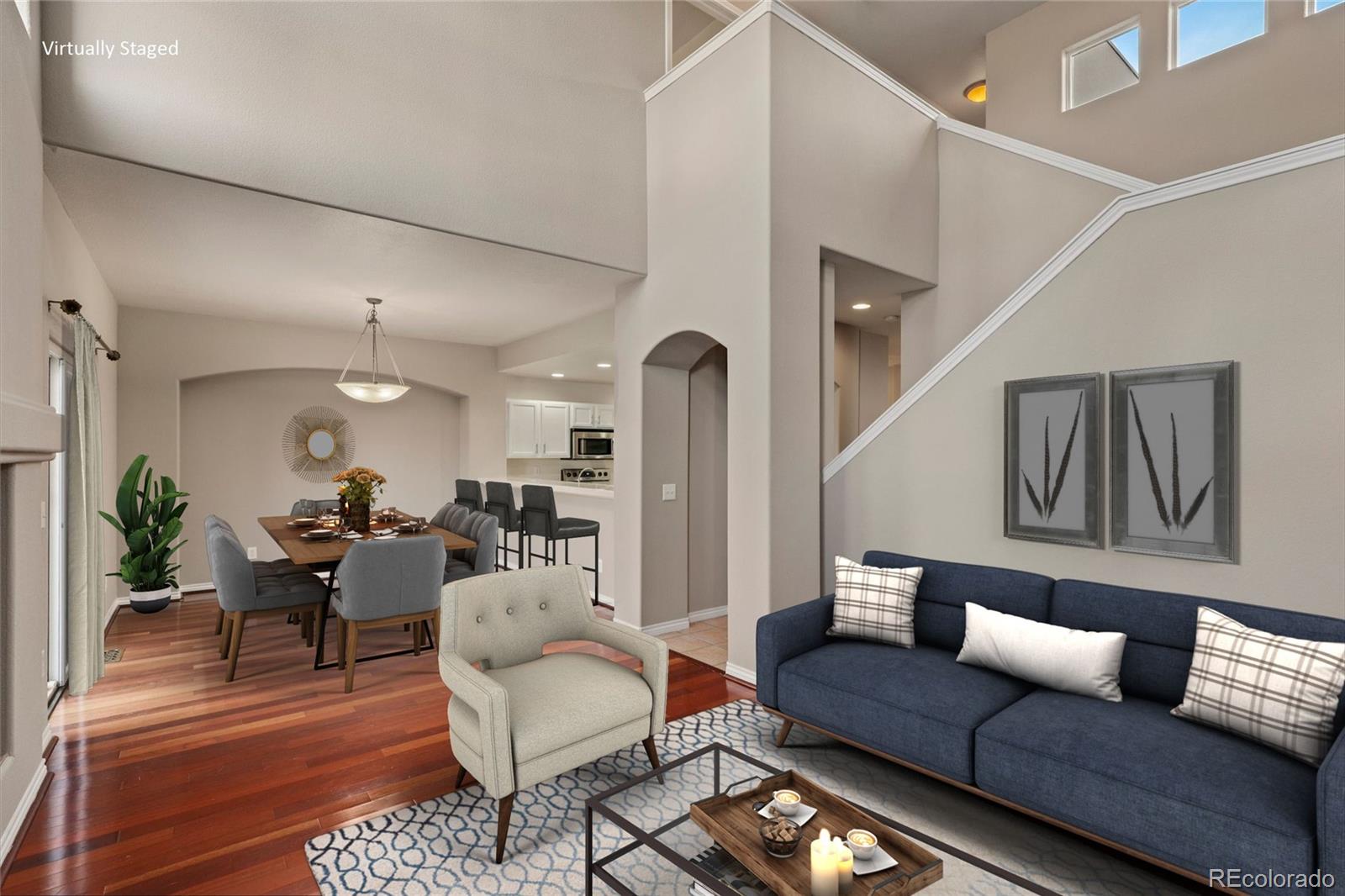 6677 South Forest Way, Unit D Centennial, CO 80121 - Photo 3 of 35 a living room with furniture and wooden floor