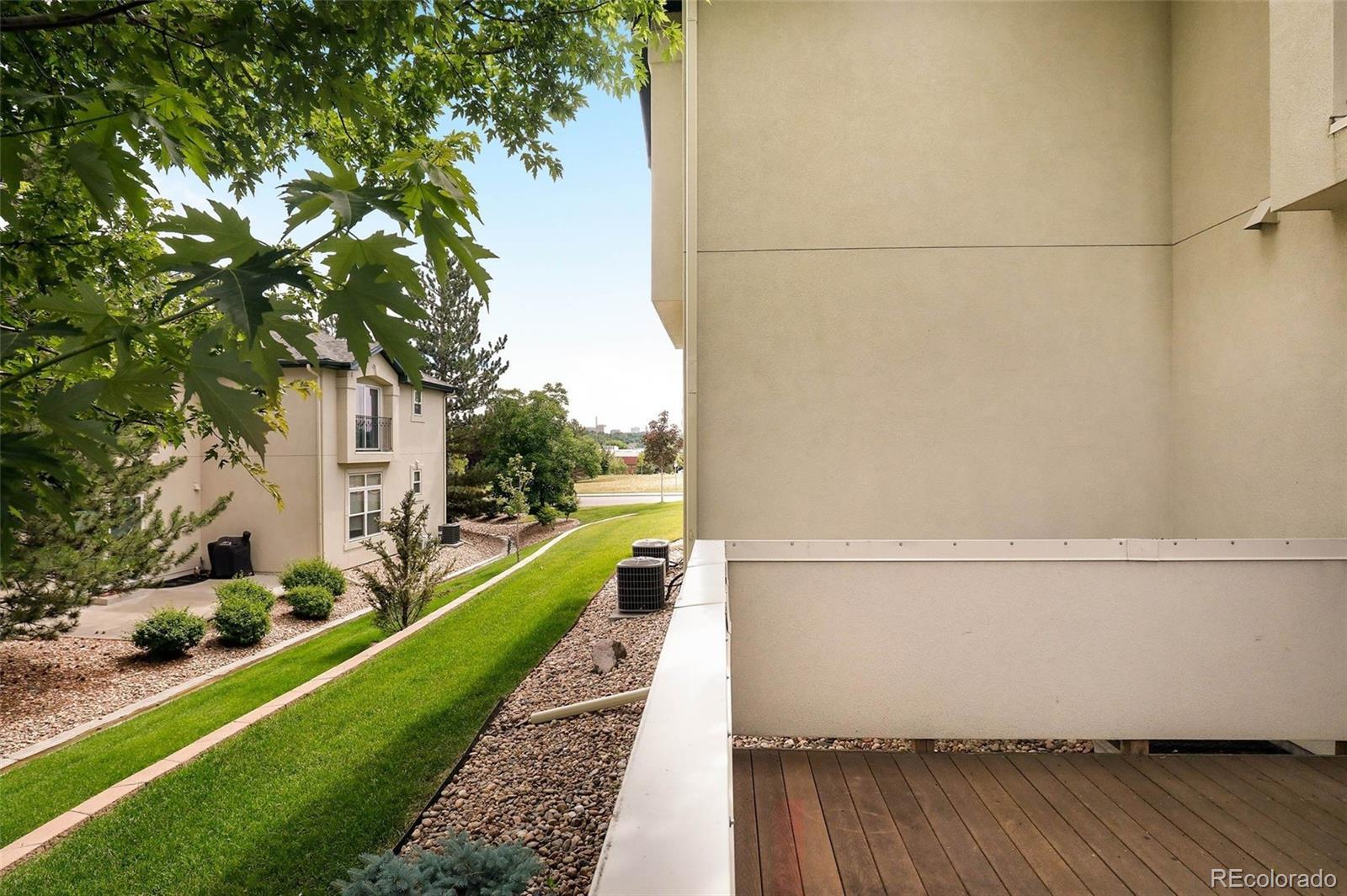 6677 South Forest Way, Unit D Centennial, CO 80121 - Photo 32 of 35 a view of a balcony with wooden floor