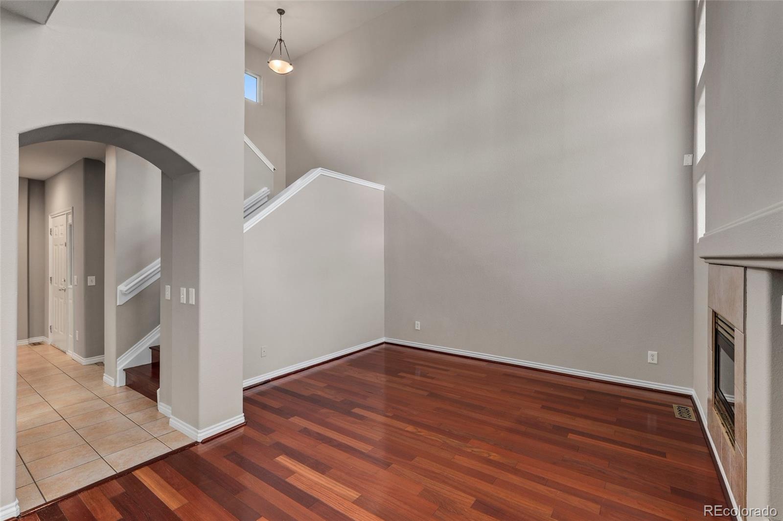 6677 South Forest Way, Unit D Centennial, CO 80121 - Photo 7 of 35 a view of empty room with wooden floor