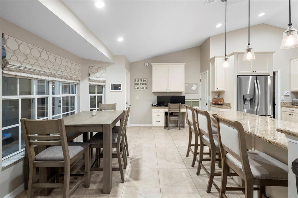 1777 Seneca Boulevard Winter Springs, FL 32708 - Photo 14 of 42 a view of a dining room with furniture