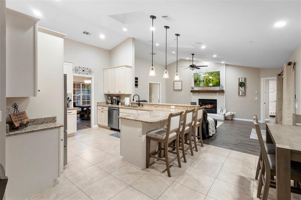 1777 Seneca Boulevard Winter Springs, FL 32708 - Photo 17 of 42 a large kitchen with a table and chairs