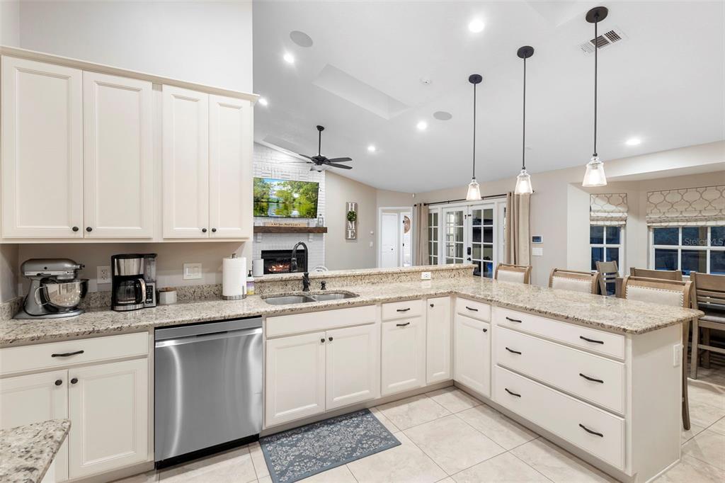 1777 Seneca Boulevard Winter Springs, FL 32708 - Photo 19 of 42 a kitchen with a sink window and cabinets