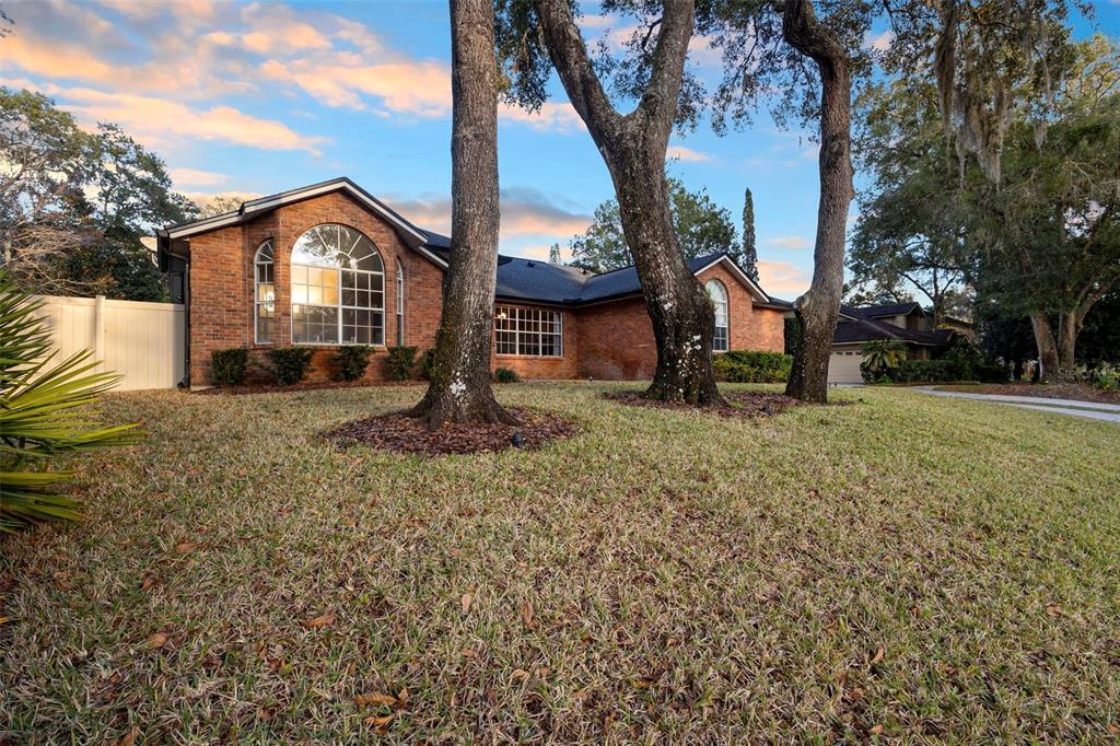 1777 Seneca Boulevard Winter Springs, FL 32708 - Photo 2 of 42 a view of a house with a sink and a yard