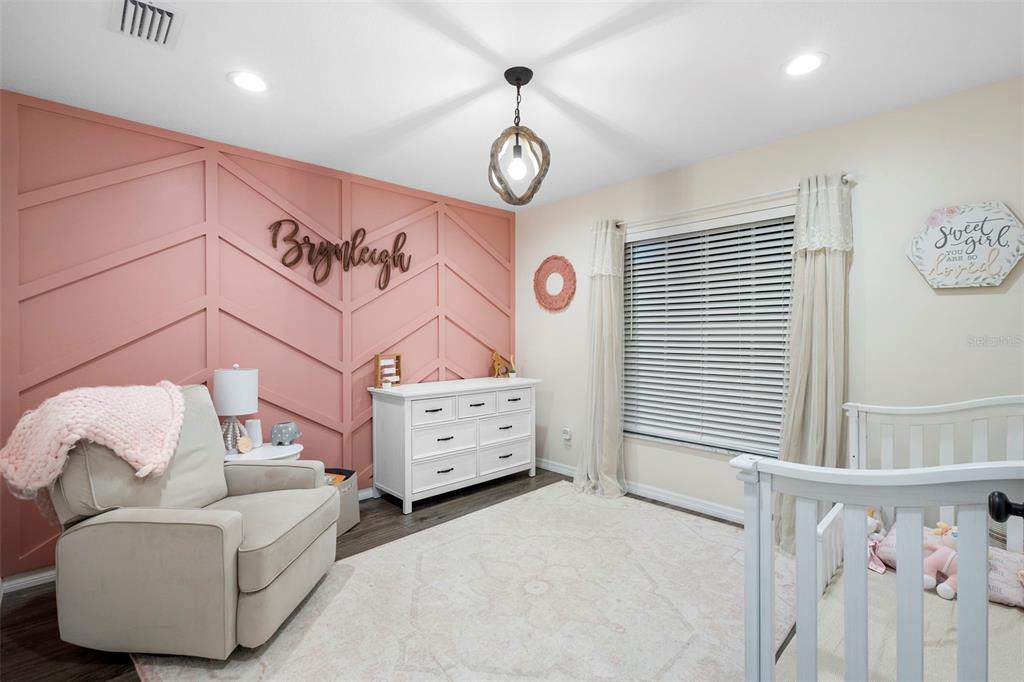 1777 Seneca Boulevard Winter Springs, FL 32708 - Photo 28 of 42 a bedroom with furniture and a window