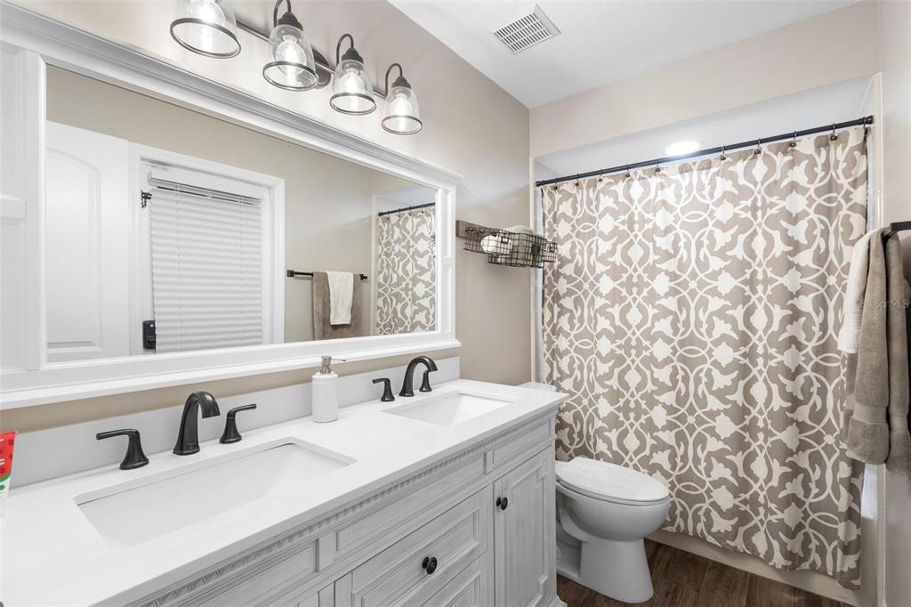 1777 Seneca Boulevard Winter Springs, FL 32708 - Photo 30 of 42 a bathroom with a sink toilet and shower