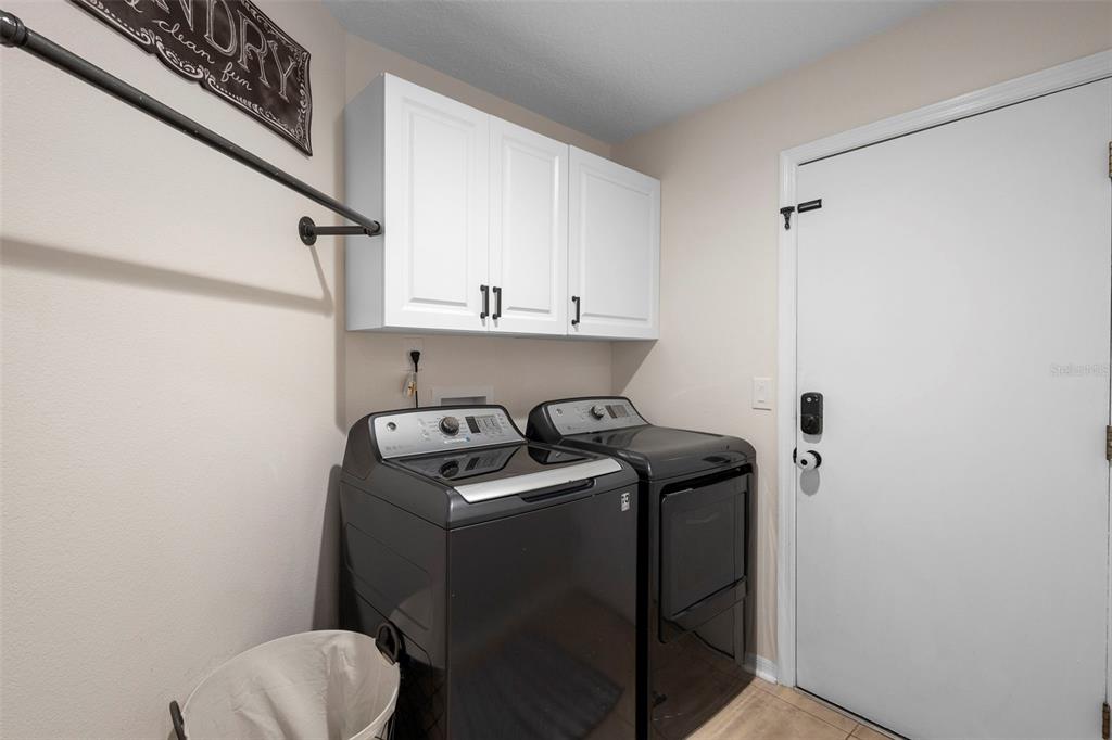 1777 Seneca Boulevard Winter Springs, FL 32708 - Photo 31 of 42 a utility room with sink dryer and washer