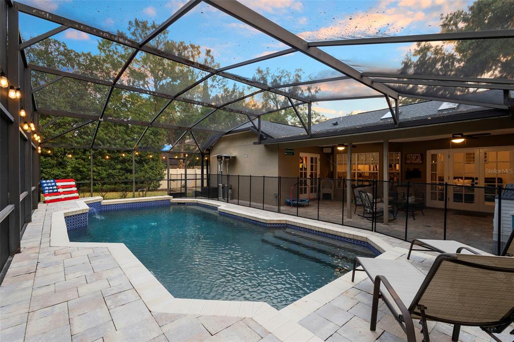 1777 Seneca Boulevard Winter Springs, FL 32708 - Photo 32 of 42 a view of a backyard with a patio and fire pit