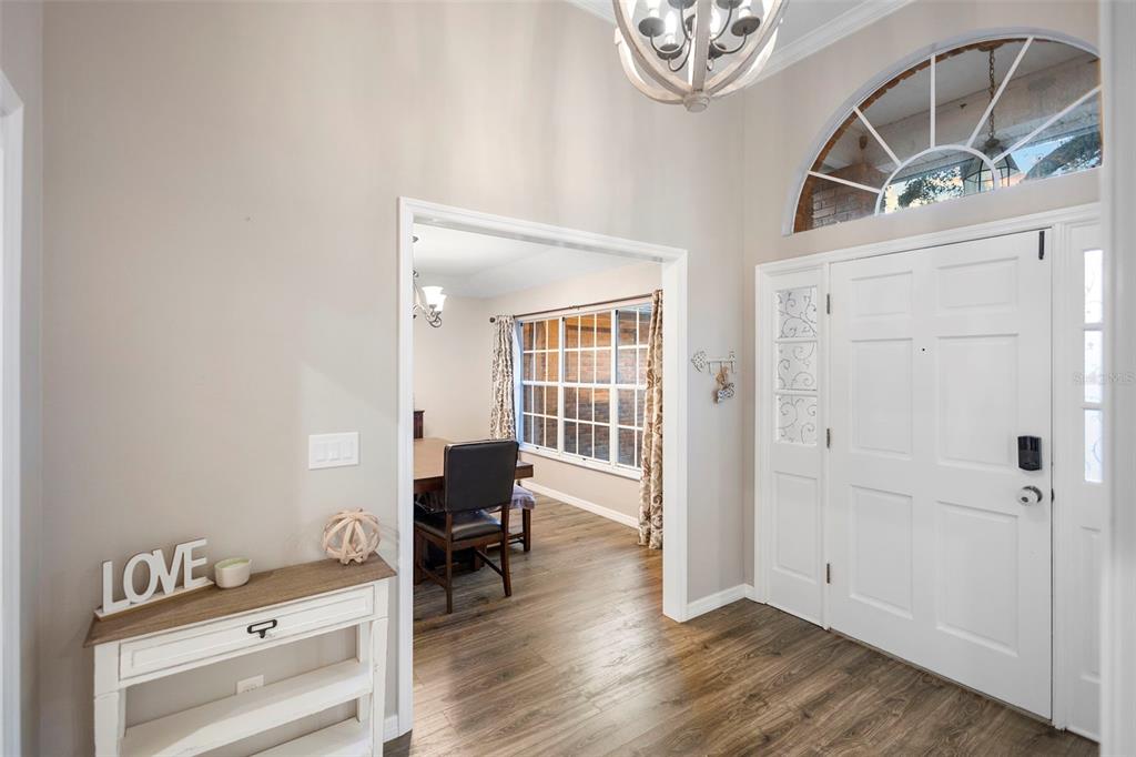 1777 Seneca Boulevard Winter Springs, FL 32708 - Photo 5 of 42 a view of room with workspace and wooden floor