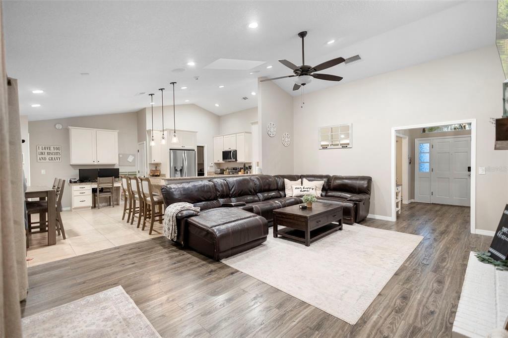 1777 Seneca Boulevard Winter Springs, FL 32708 - Photo 10 of 42 a living room with lots of furniture and kitchen view