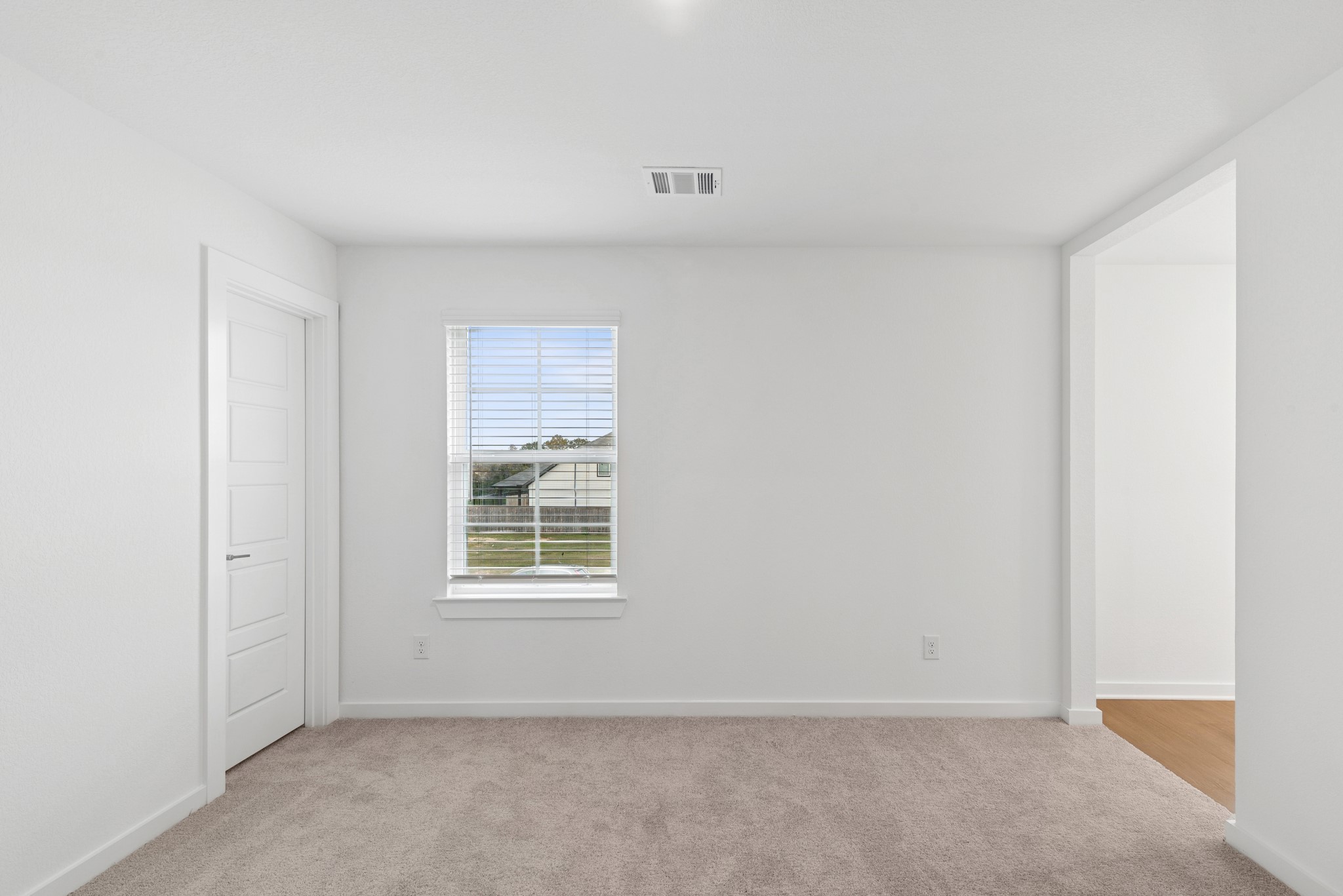 32503 Midsummer Drive Fulshear, TX 77441 - Photo 31 of 48 a view of an empty room with a window