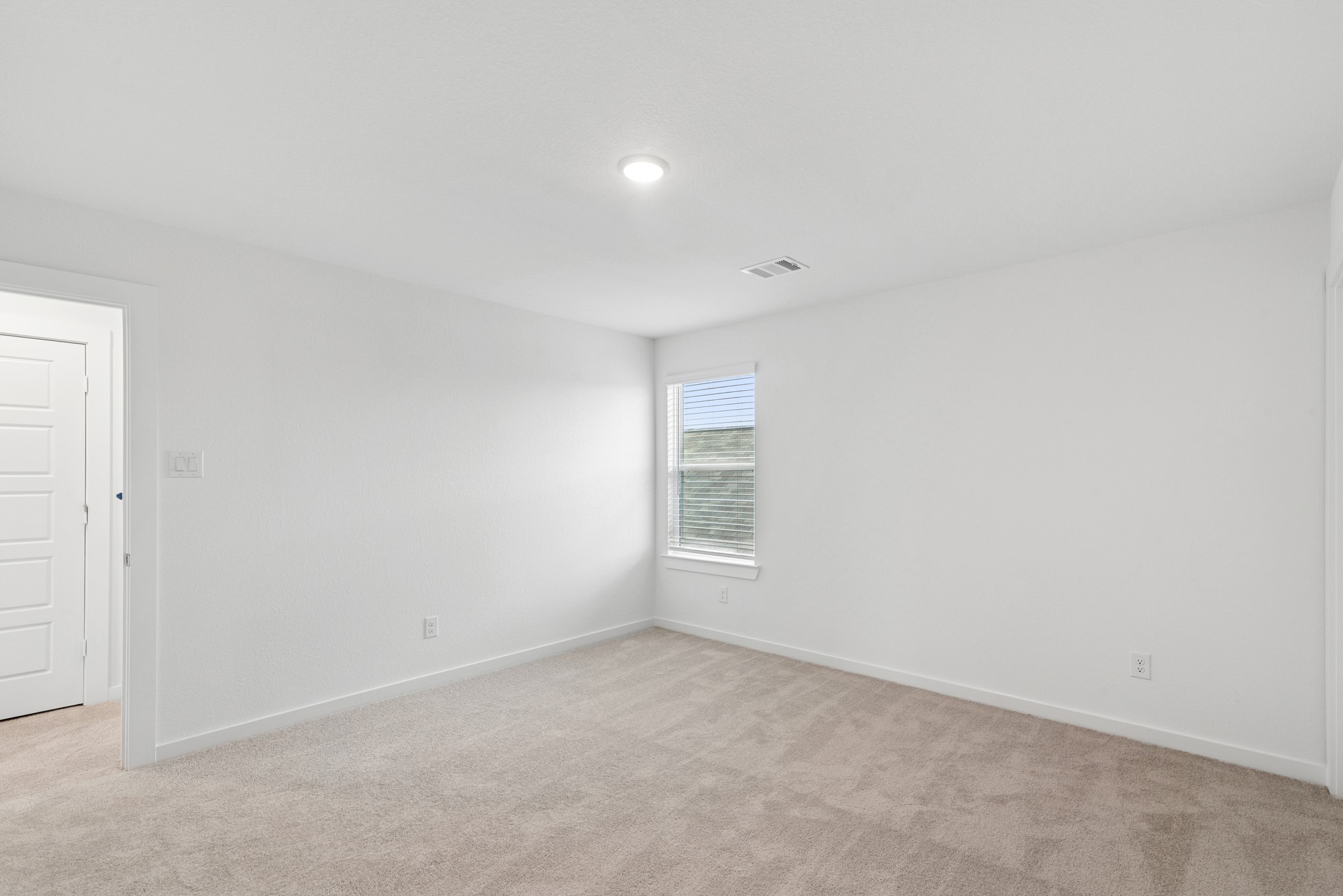 32503 Midsummer Drive Fulshear, TX 77441 - Photo 36 of 48 an empty room with windows