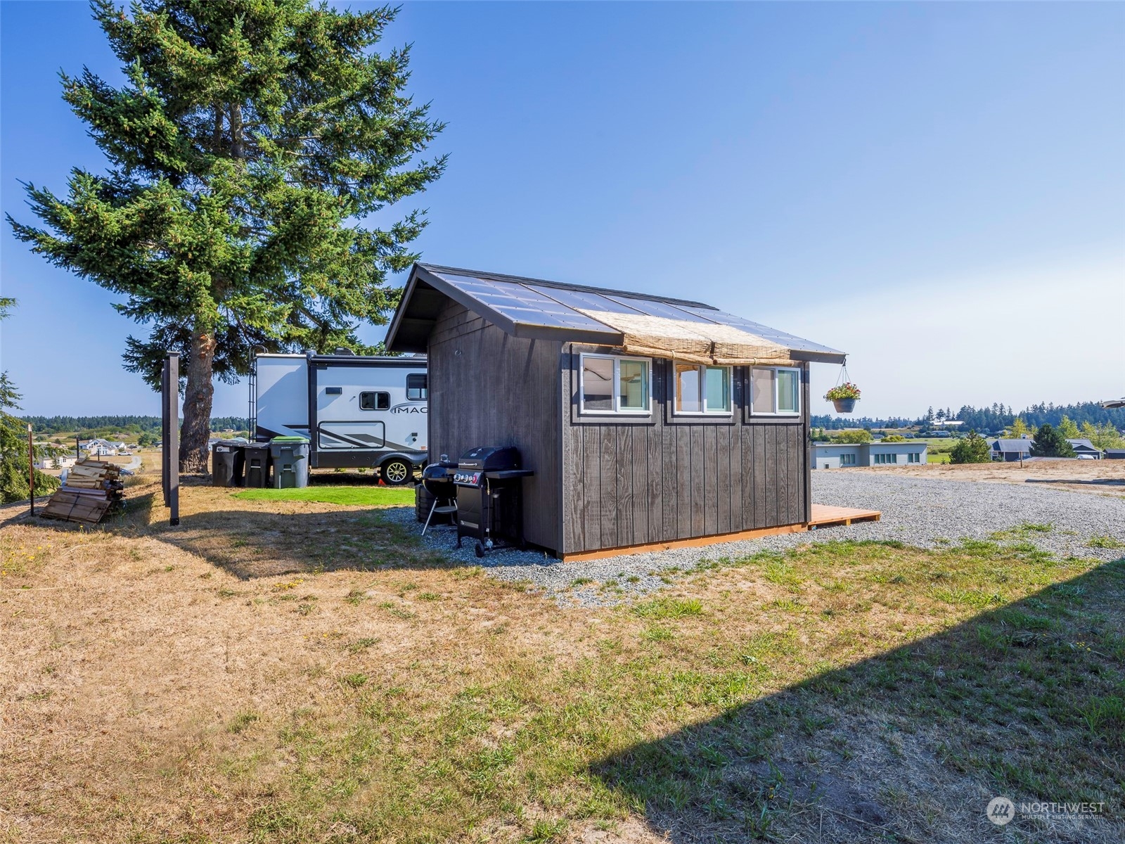 444 Buckhorn Road Sequim, WA 98382 - Photo 3 of 29 a view of a house with swimming pool