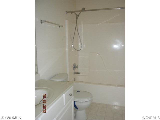 4315 Broad St Road Gum Spring, VA 23065 - Photo 7 of 10 a bathroom with a toilet and a shower