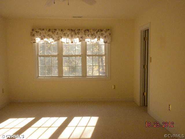 4315 Broad St Road Gum Spring, VA 23065 - Photo 8 of 10 a view of an empty room with a window
