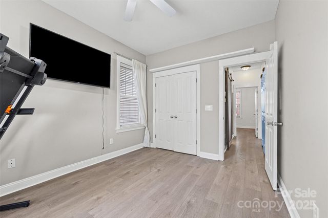 a view of a livingroom with wooden floor