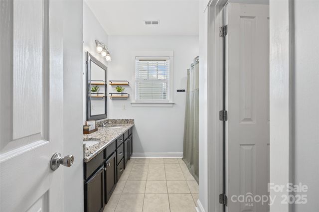 a hallway with cabinets