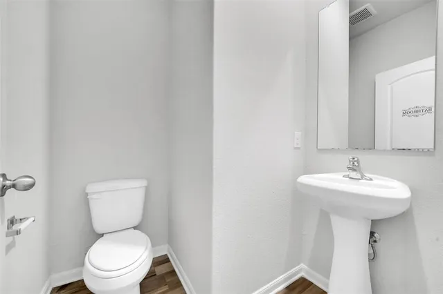 a house view with a backyard space