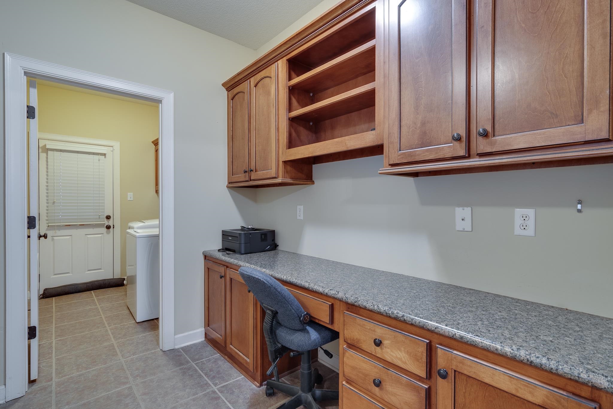 5350 Evergreen Road Lakeland, TN 38002 - Photo 16 of 24 Unfurnished office with built in desk and washer / dryer