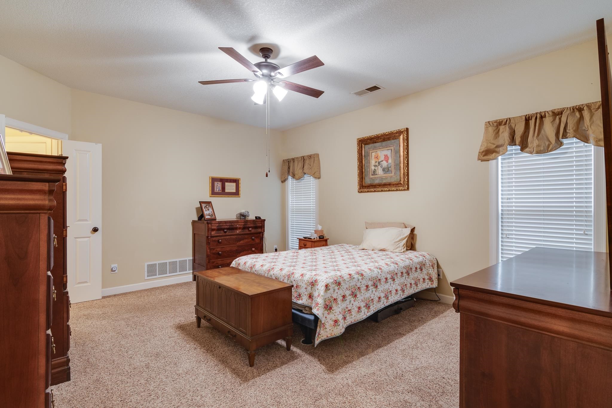 5350 Evergreen Road Lakeland, TN 38002 - Photo 21 of 24 Bedroom with ceiling fan, light colored carpet, and a textured ceiling