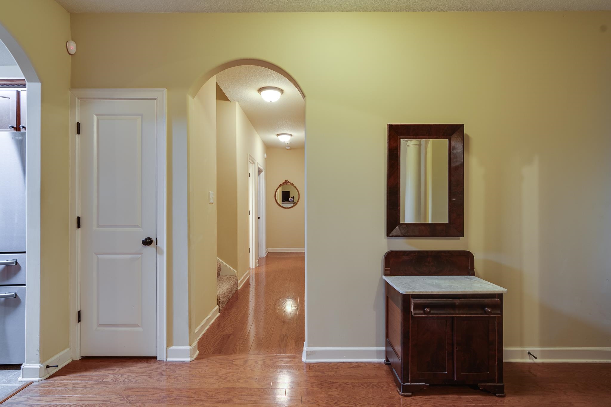Corridor featuring light hardwood / wood-style flooring