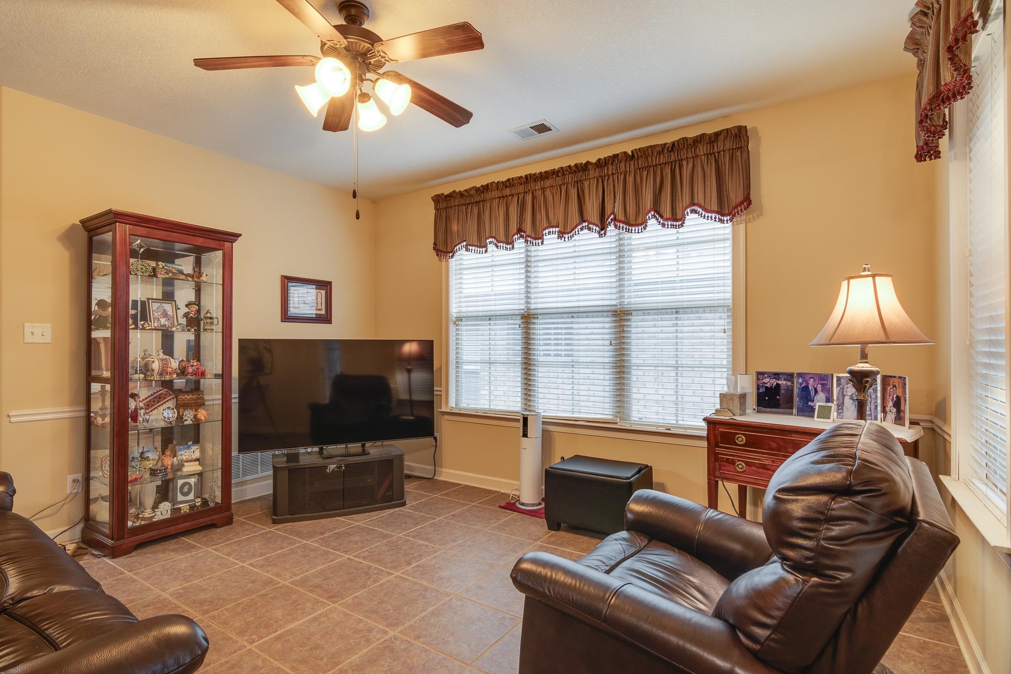 5350 Evergreen Road Lakeland, TN 38002 - Photo 10 of 24 Tiled living room featuring ceiling fan