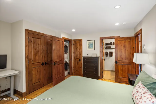 a bedroom with a bed and furniture