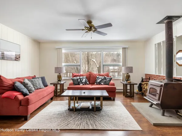 a kitchen with stainless steel appliances granite countertop a stove sink and cabinets