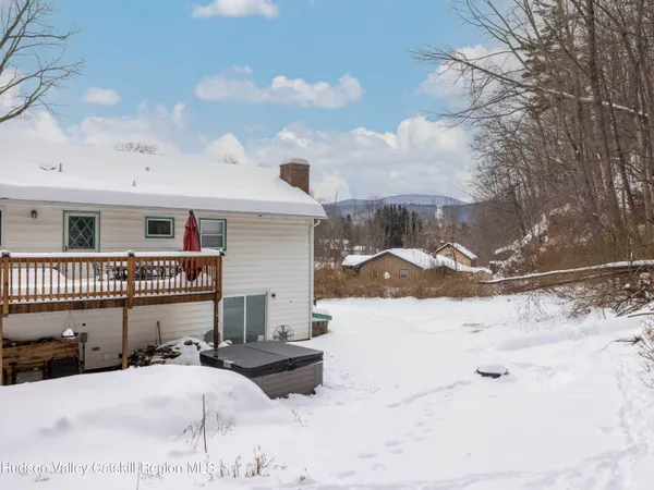 a view of a terrace with wooden fence