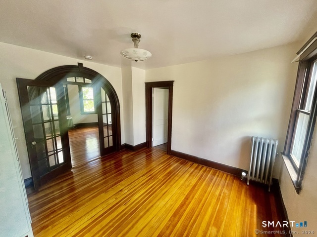 64 East Pearl Street Torrington, CT 06790 - Photo 2 of 6 a view of empty room with wooden floor