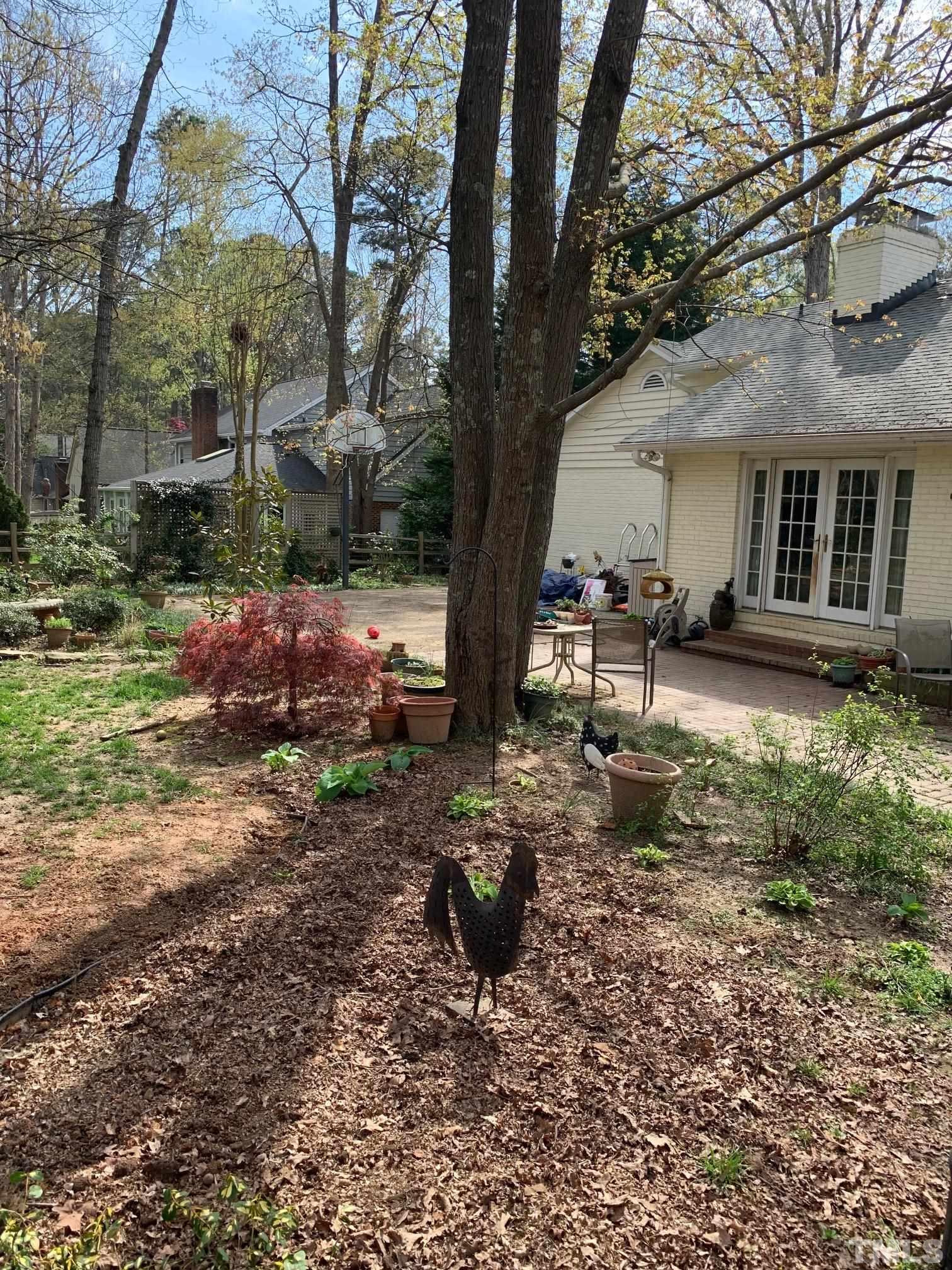 905 Queensferry Road Cary, NC 27511 - Photo 2 of 10 a view of a house with backyard and sitting area