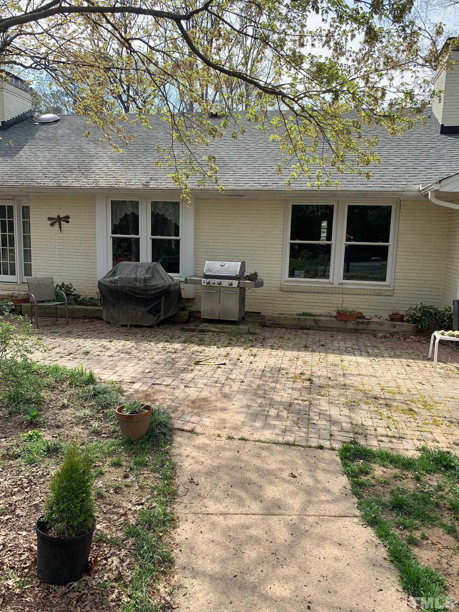 905 Queensferry Road Cary, NC 27511 - Photo 8 of 10 a view of a house with backyard and sitting area