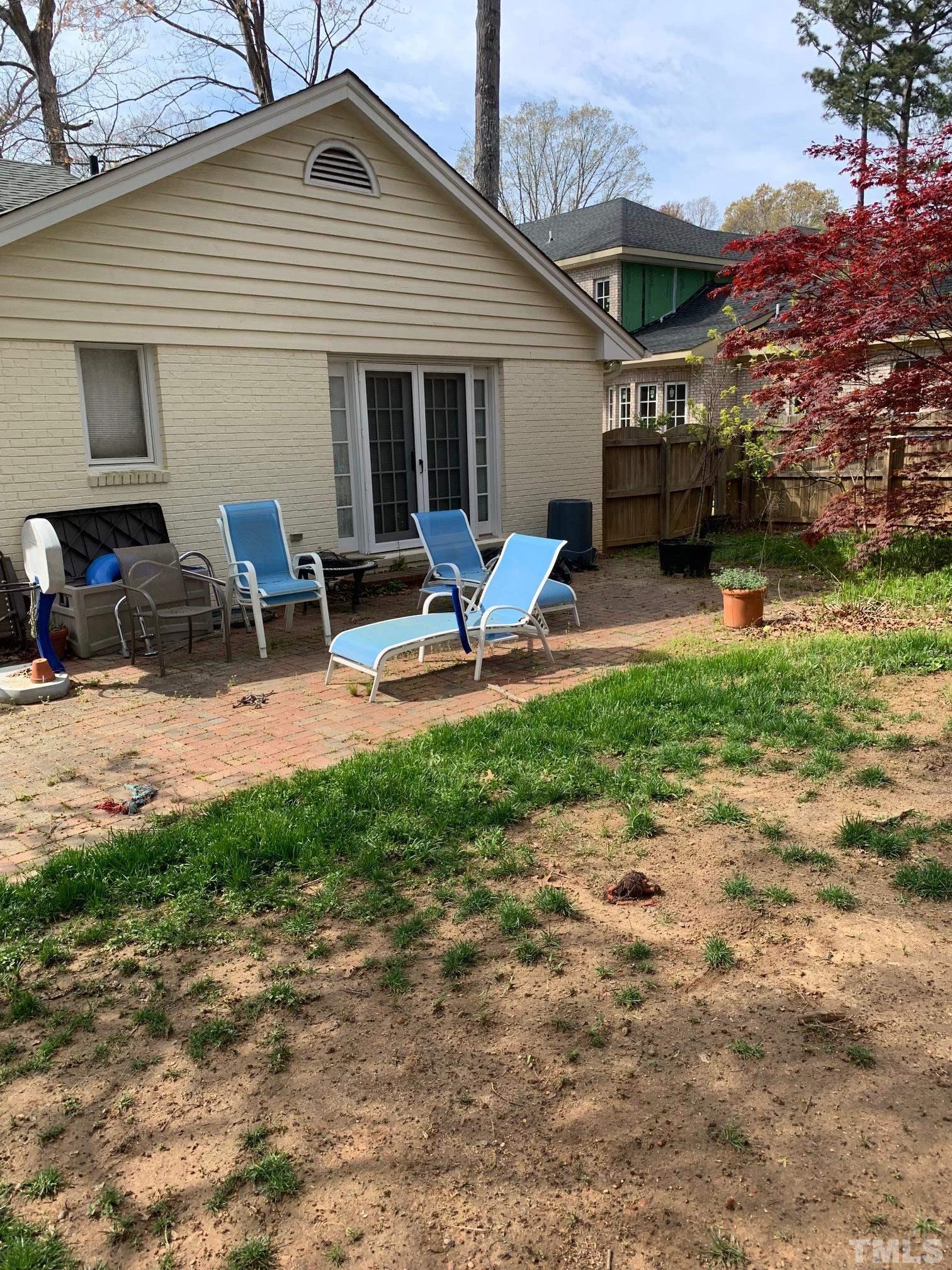905 Queensferry Road Cary, NC 27511 - Photo 9 of 10 a view of backyard with outdoor seating and green space