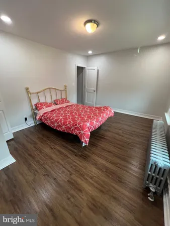 a bed room with a bed and window