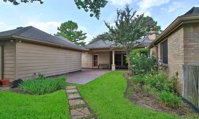 a front view of a house with garage