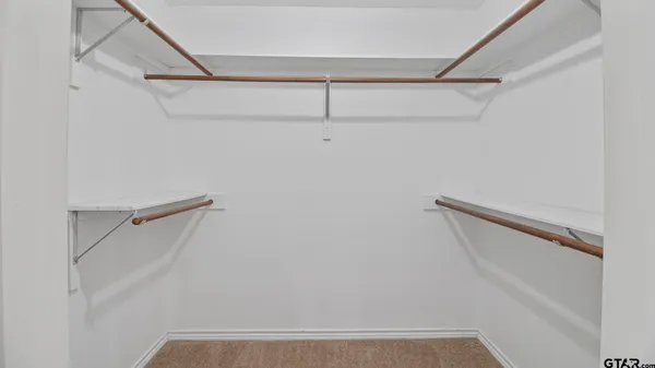 a view of small space with racks on the wall