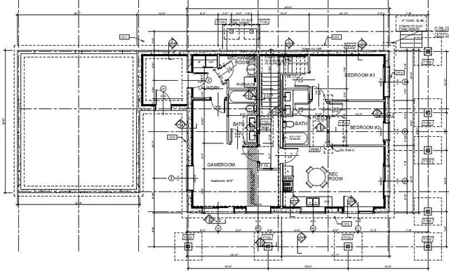 a view of a yard with wooden fence