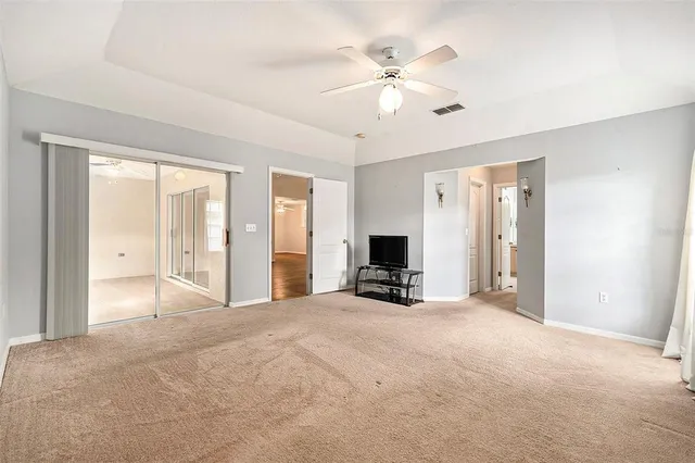 a view of a livingroom with a workspace