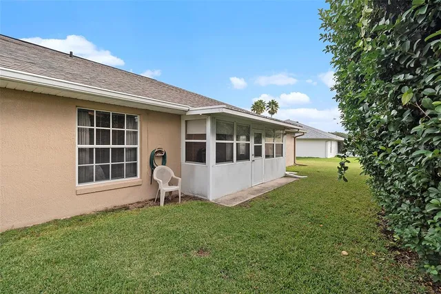 a front view of a house with a yard and porch