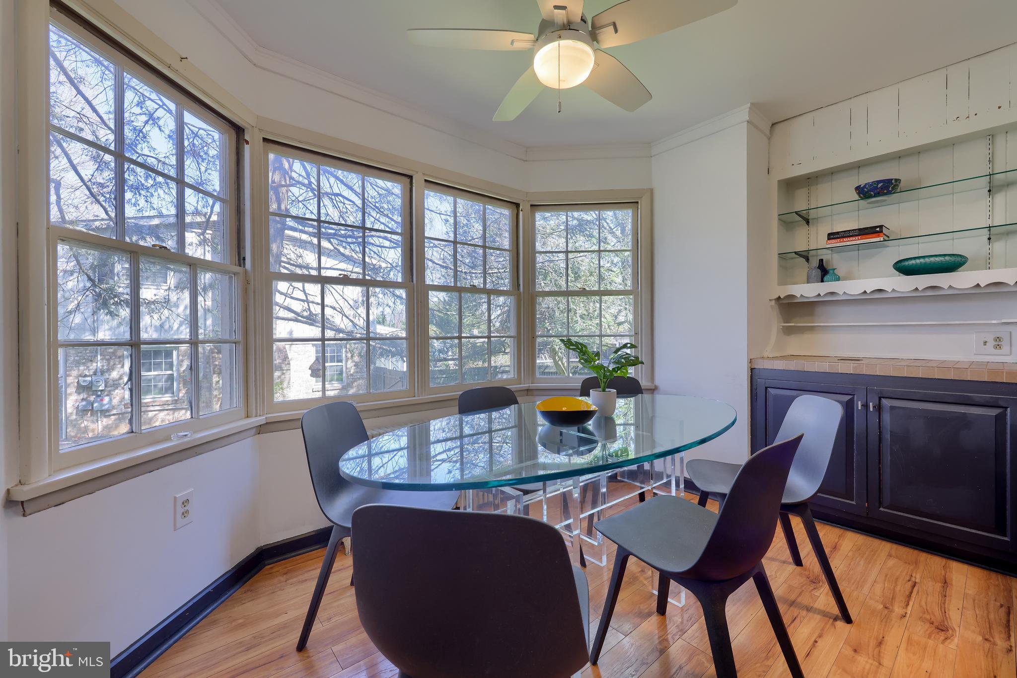613 South Broad Street Lititz, PA 17543 - Photo 19 of 60 a view of a dining room with furniture a chandelier and wooden floor