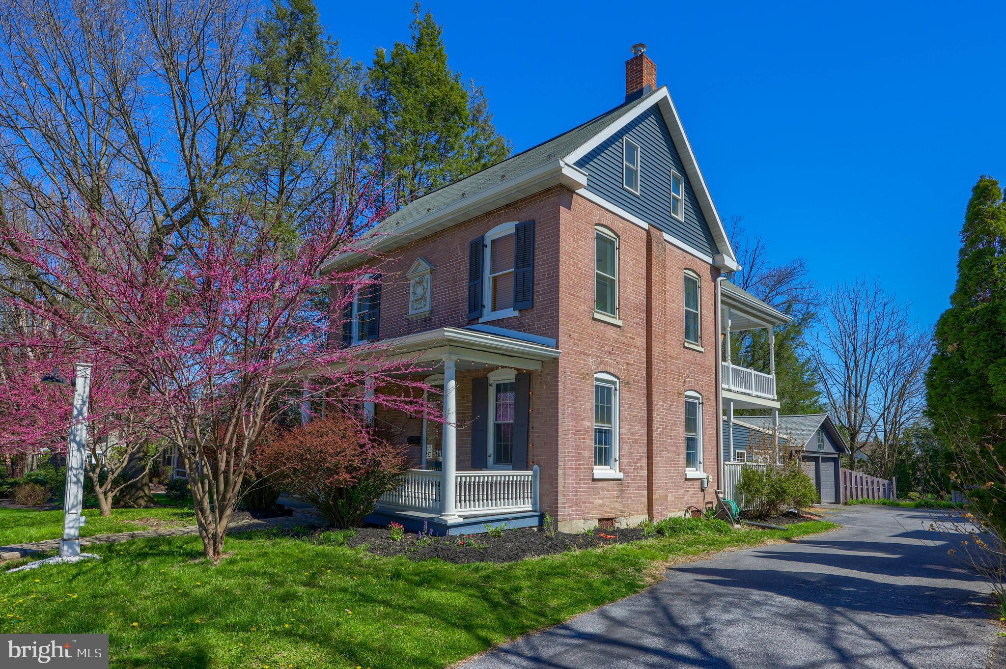 613 South Broad Street Lititz, PA 17543 - Photo 60 of 60 a front view of a house with garden