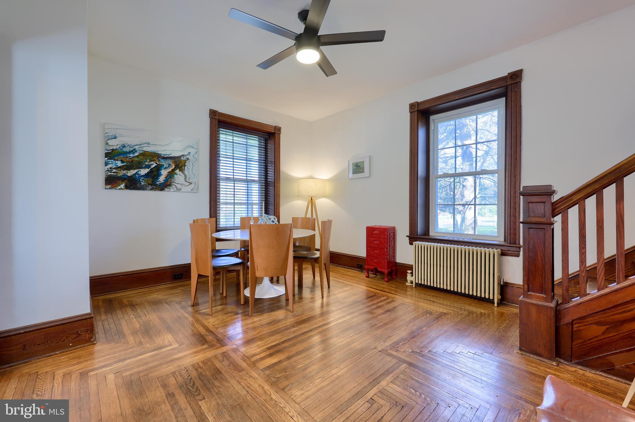 613 South Broad Street Lititz, PA 17543 - Photo 8 of 60 a dining room with furniture a chandelier and wooden floor